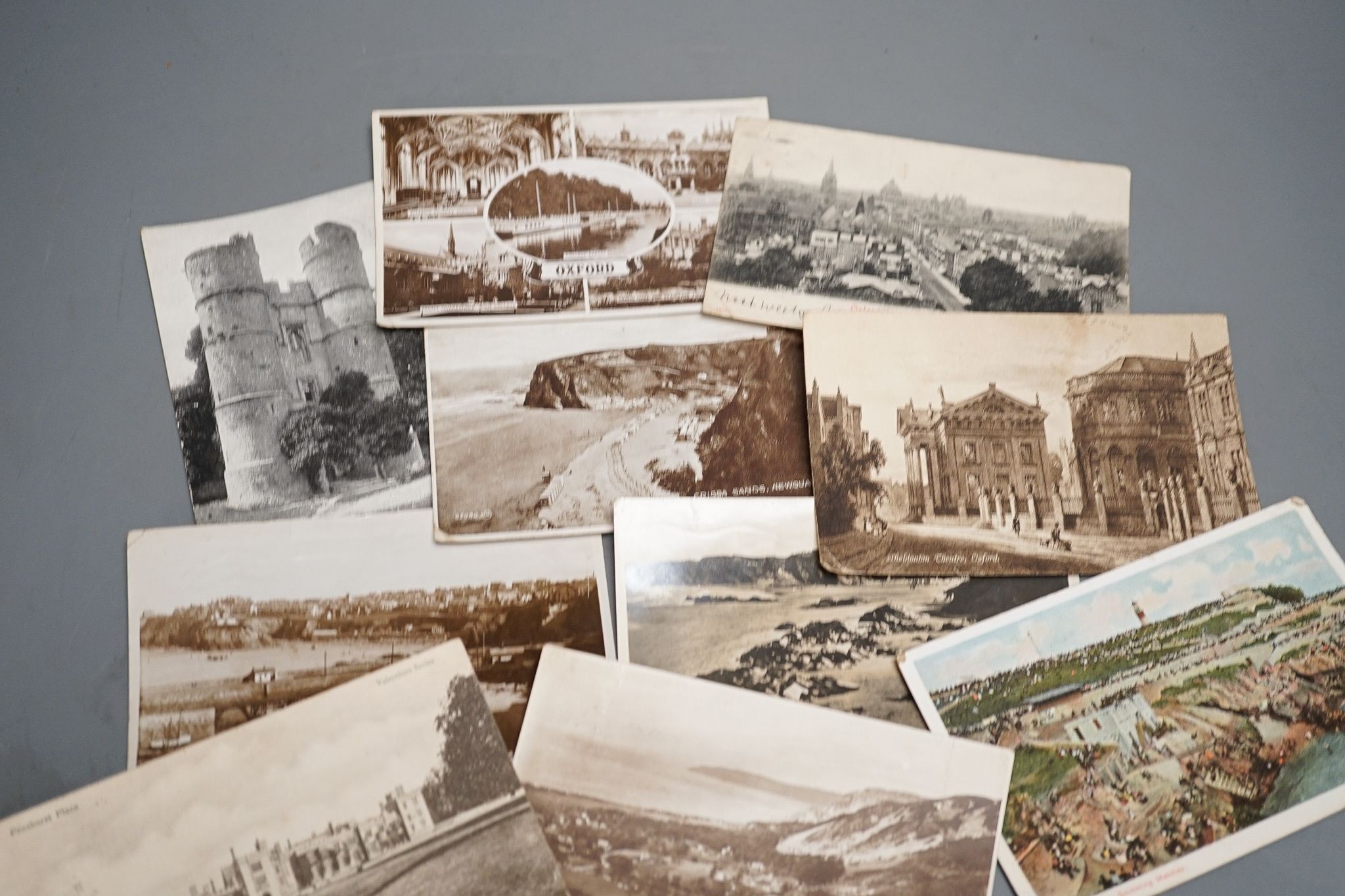 Four albums of postcards and a large collection of loose postcards, mainly British topographical, Victorian cabinet photographs, etc.